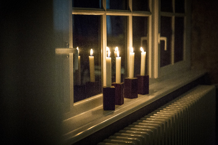 Candles on windowsillの写真素材