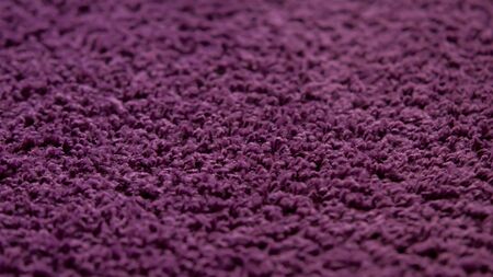 A purple carpet close-up photo.の写真素材