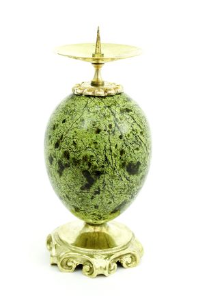 Candlestick made of stone serpentine  isolated  on whiteの写真素材