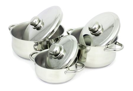 Pans made of stainless steel on a white backgroundの写真素材