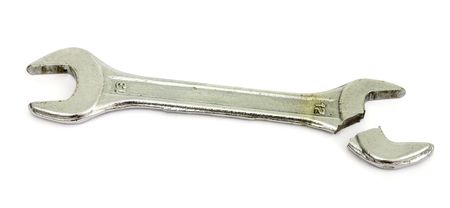One broken wrench lies on  white backgroundの写真素材