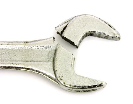 One broken wrench lies on  white backgroundの写真素材
