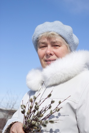 The elderly woman on stroll in spring dayの写真素材