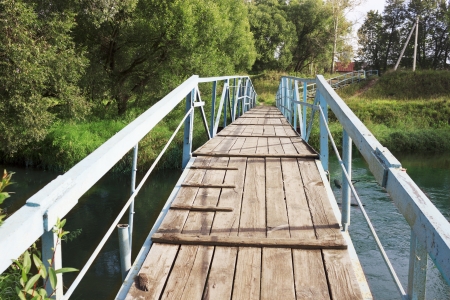 The bridge over the river in a provincial town  Russiaの写真素材