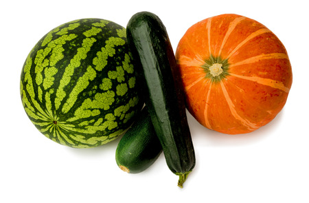 Ripened watermelon, zucchini and pumpkin on a white backgroundの写真素材