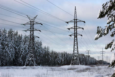 High voltage lines on a december day. Frosty winter weather