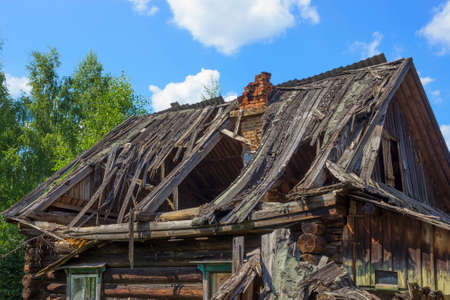 Roof abandoned wooden old house, desolation and ruin, an old village house Inforesの写真素材
