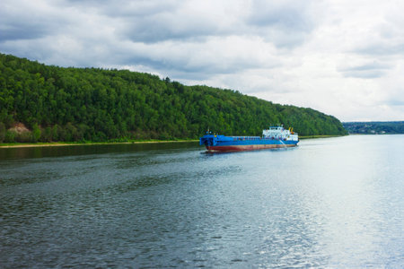 Empty bulk carrier heading downstream. July. Volga. Russiaの写真素材