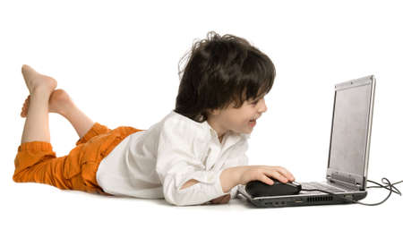The merry  boy with laptop on white backgroundの写真素材