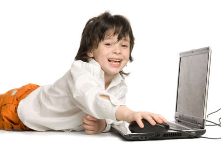 The merry  boy with laptop on white backgroundの写真素材