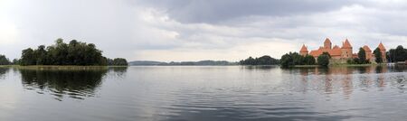 Lake Galve panorama. On the right side  a panorama of castle on a Trakaiの写真素材