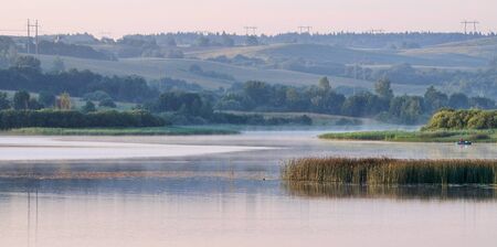 Early morning. A fog over lake