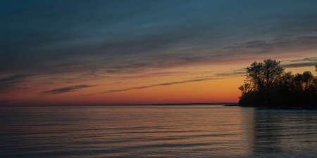 The time of calm. Sunrise in Curonian lagoon, Vente Cape. Early morning.の写真素材