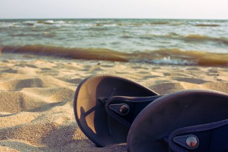 Slippers on shoreの写真素材