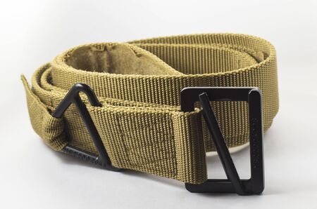 Military belt on a white backgroundの写真素材