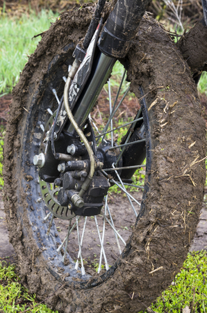 Cross-wheel motorcycle in the mudの写真素材
