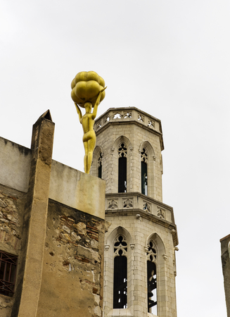 Surrealism on the background of the medieval towerの写真素材