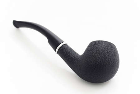 Black pipe for smoking on white backgroundの写真素材