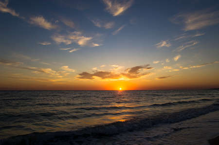 Landscape of a beautiful sunrise over the seaの写真素材