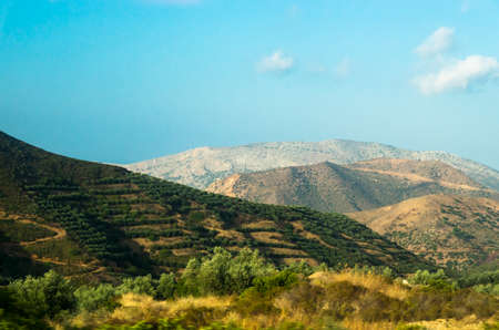 Landscape of high hills in Crete on the background of the skyの写真素材