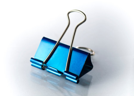 One blue binder on a white backgroundの写真素材