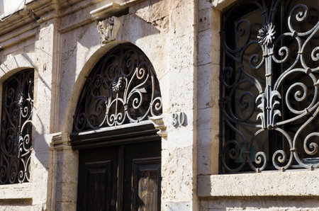 Facade of an old Greek house with door and windowsの写真素材