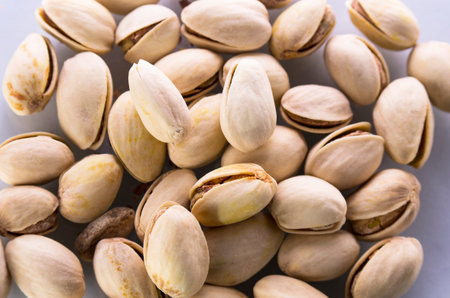 Group of pistachio nuts on white backgroundの写真素材