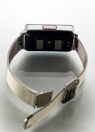 Smart watch with metal bracelet on white backgroundの写真素材