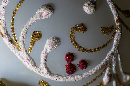 Pattern of multi-colored sparkles on a white background, close-upの写真素材