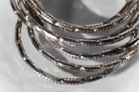 Silver chain close-up on white backgroundの写真素材