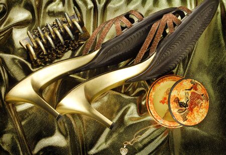 golden womans shoes and accessoriesの写真素材