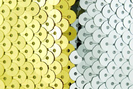 golden and silver fish scale fabric textureの写真素材