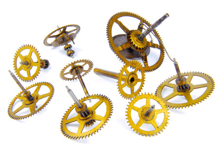 parts of clockwork isolated on whiteの写真素材