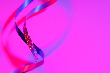 serpentine confetti  and  pink purple lightingの写真素材