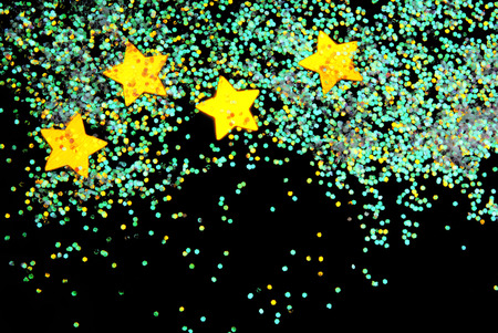 golden stars with glitter  on black