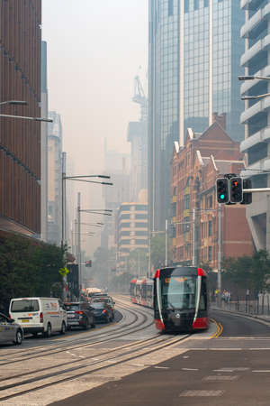 Sydney, Australia - December 10, 2019: Sydney Light Rail Release date in Smoke damaged Streets of...