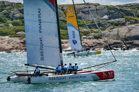 MARSTRAND, SWEDEN - JULI 3, 2019: GKSS Match Cup Sweden - Big Boat Race M32 Catamaran Competition at Marstrand Sweden - One Big Boat Catamaran Sailing Windy condition at Marstrand Race in Sweden.のeditorial素材