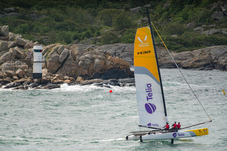 MARSTRAND, SWEDEN - JULI 3, 2019: GKSS Match Cup Sweden - Big Boat Race M32 Catamaran Competition at Marstrand Sweden - One Big Boat Catamaran Sailing Windy condition at Marstrand Race in Sweden.のeditorial素材