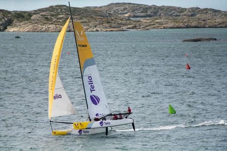 MARSTRAND, SWEDEN - JULI 3, 2019: GKSS Match Cup Sweden - Big Boat Race M32 Catamaran Competition at Marstrand Sweden - One Big Boat Catamaran Sailing Windy condition at Marstrand Race in Sweden.のeditorial素材