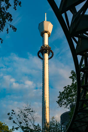 GOTHENBURG, SWEDEN - JULY 8, 2019: People screaming and holding up hands during roller coaster ride Helix at Liseberg amusement park Gothenburg Sweden - People having fun at their leisure.のeditorial素材
