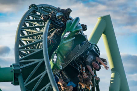 GOTHENBURG, SWEDEN - JULY 8, 2019: People screaming and holding up hands during roller coaster ride Helix at Liseberg amusement park Gothenburg Sweden - People having fun at their leisure.のeditorial素材