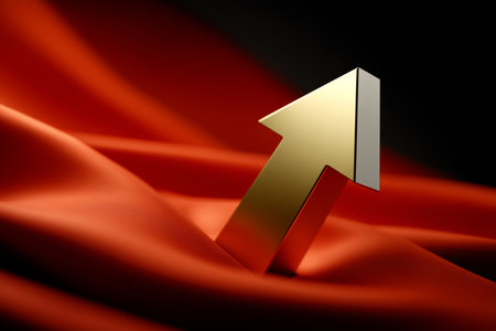 This sleek golden arrow symbolizes progress and success, elegantly positioned on rich red fabric, creating a striking contrast and a sense of aspiration.の素材