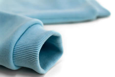 Detail of the sleeve of a blue sweatshirt with a close-up cuff.の写真素材