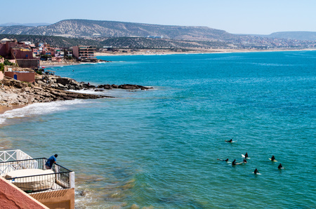 Surfers in Taghazout waiting for next waveの写真素材