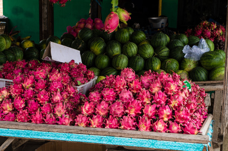 Dragon fruits and melons at local place in Java, Indonesiaの写真素材