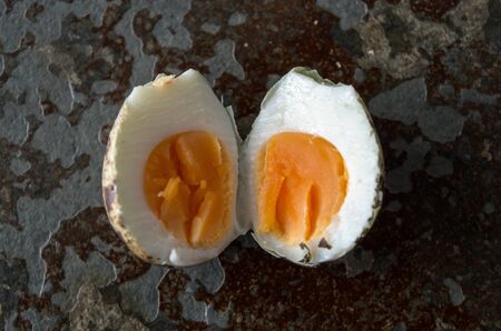 Quail egg open centered from birds eye.の写真素材