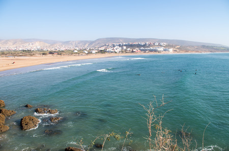 People surfing the waves at surf spot called Banana Point in Morocco, January 2018.の写真素材