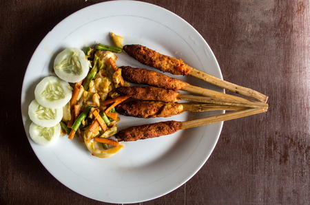 Indonesian dish Lombok: Sate Pusut (marinated meat mix on stick) birds eye.の写真素材