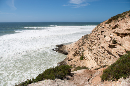 Waves rolling in at Killer Point surf spot near Taghazout.の写真素材