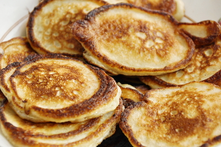 delicious mama fritter pancakes with a slide on the platter